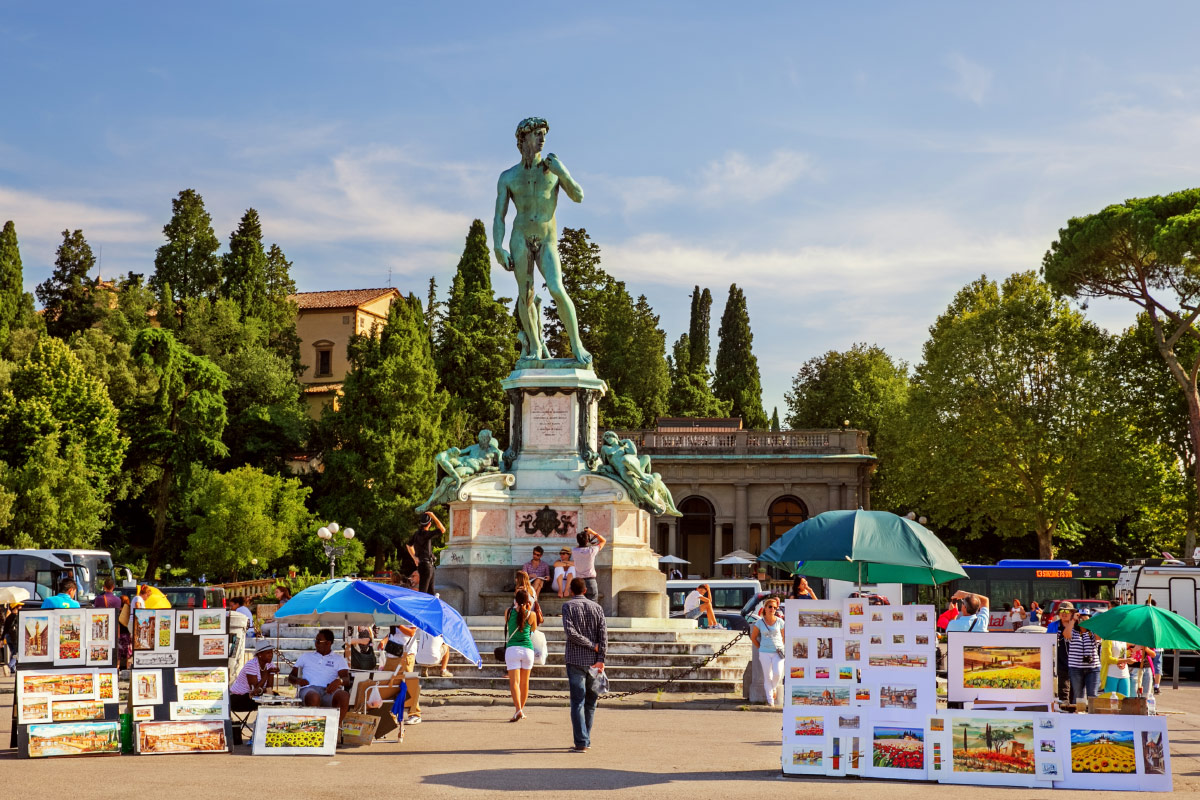 Bronze David replica above artists' stalls at Piazzale Michelangelo in Florence