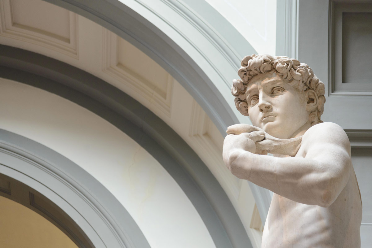Close-up of Michelangelo's marble David inside the Accademia Gallery in Florence