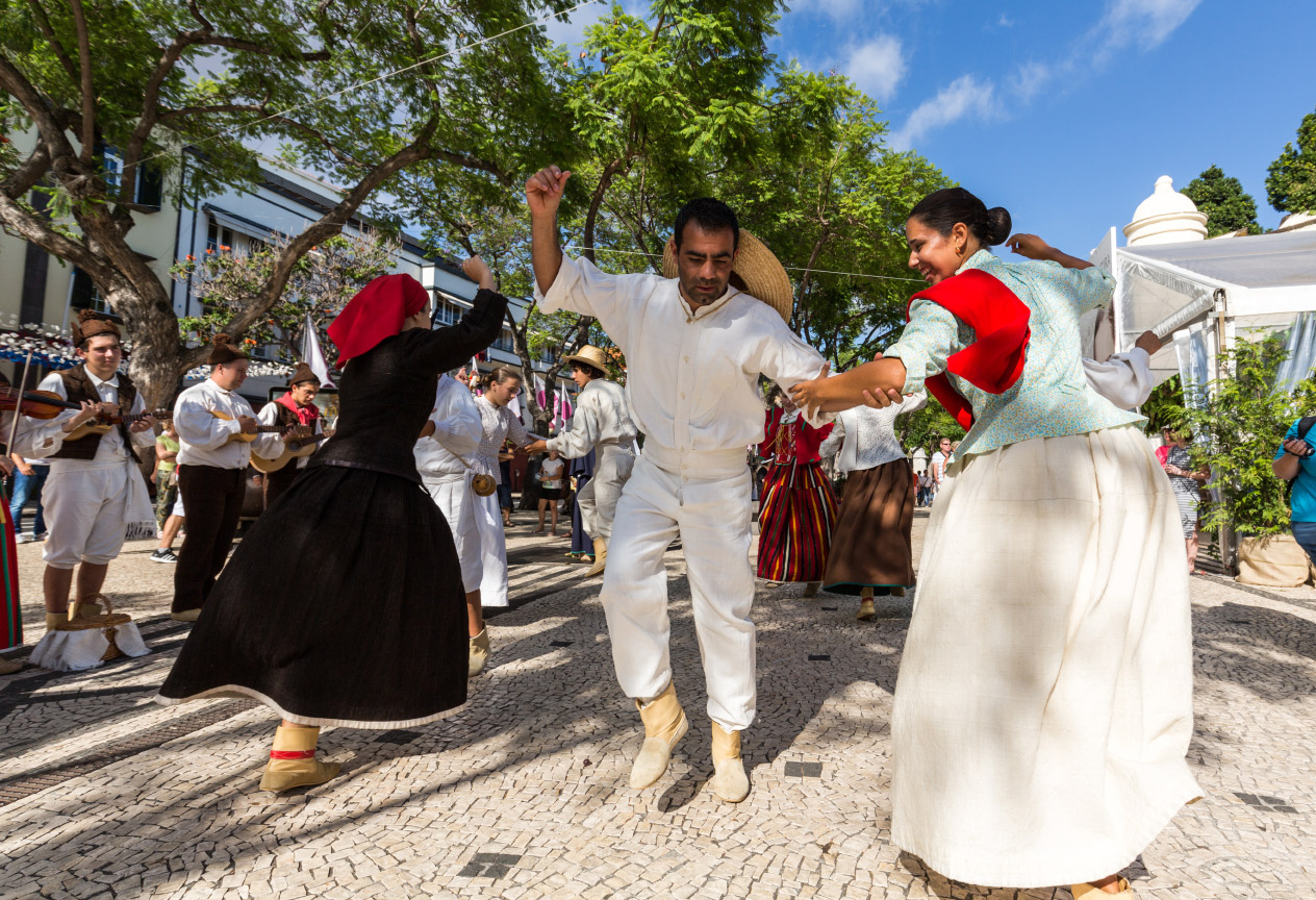 Locals dance in street in Portugal