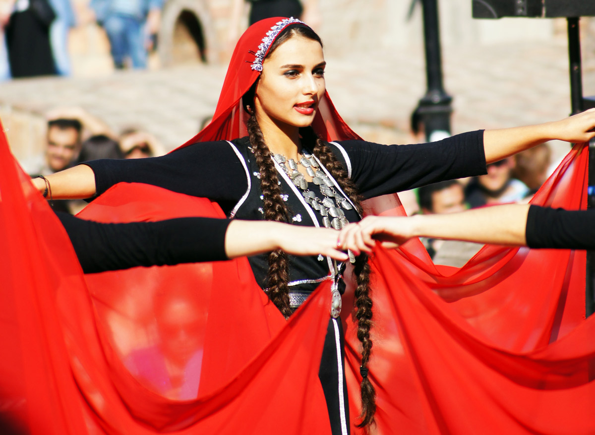 Tbilisoba, in georgian traditional costume is dancing Djeiran dance