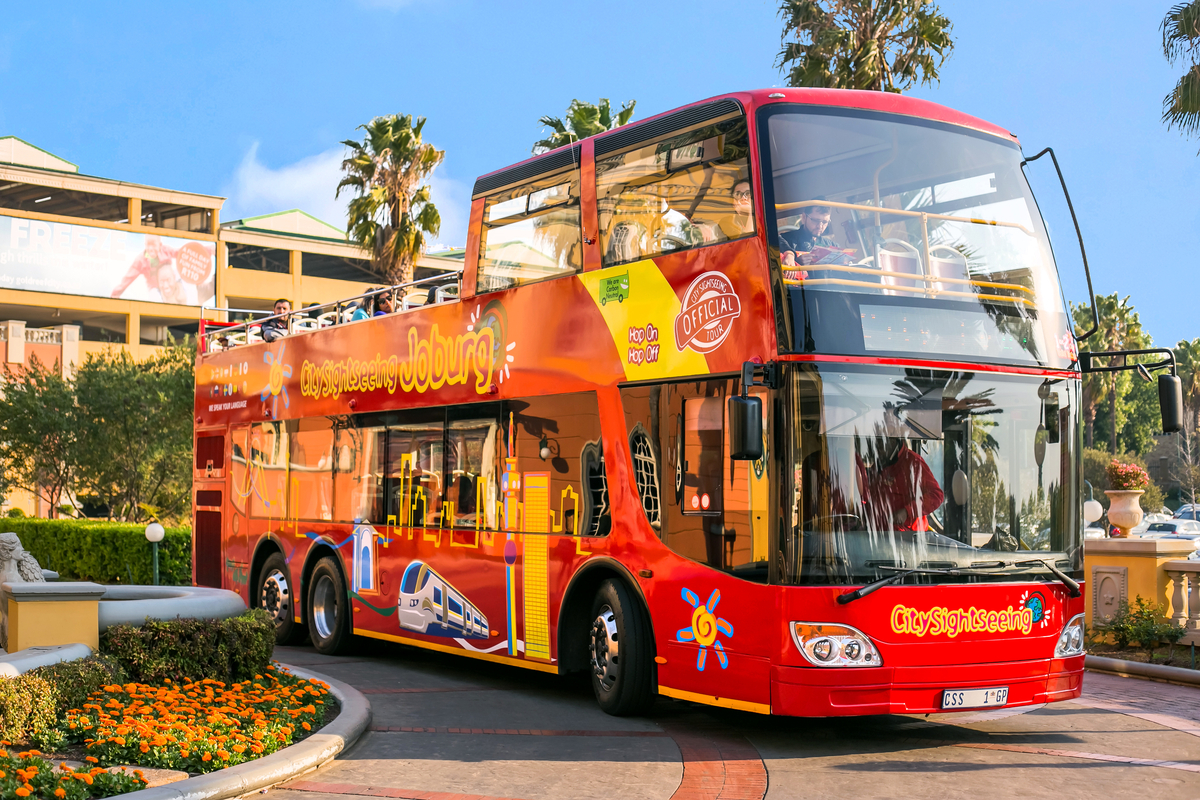 Red open-top hop-on hop-off sightseeing bus in Johannesburg, South Africa