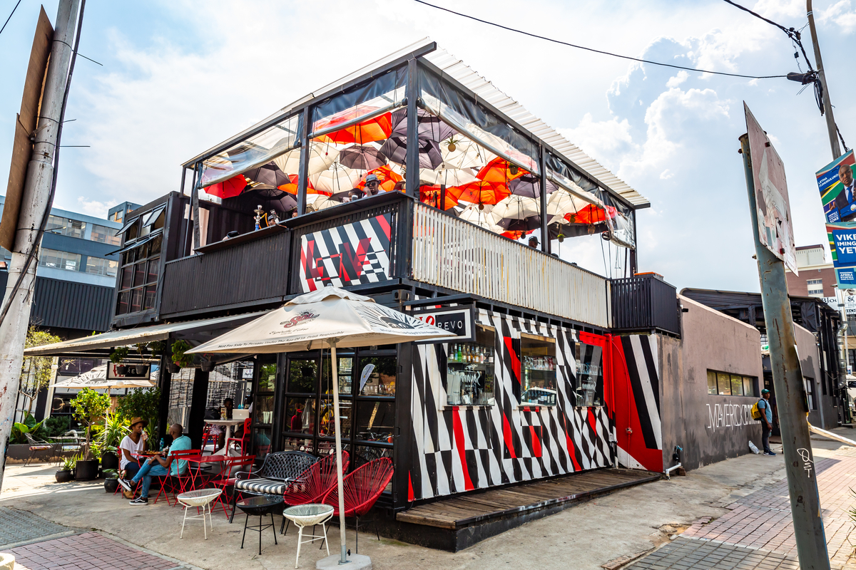 Colourful shipping container cafe with outdoor seating in Maboneng, Johannesburg