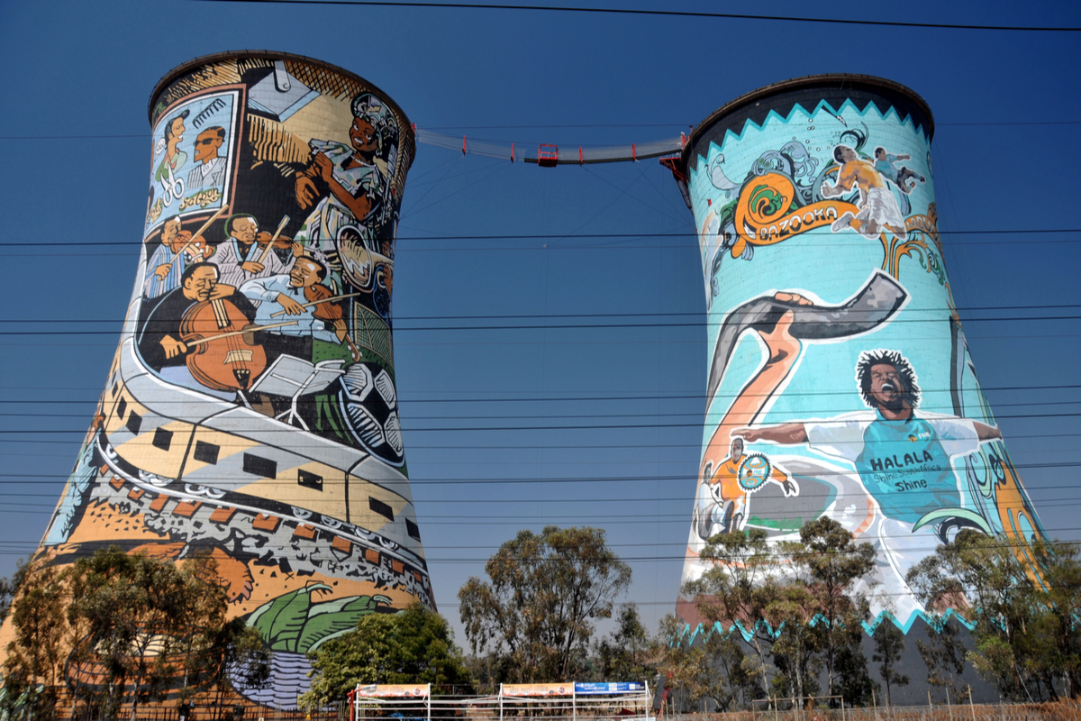 Painted Orlando Towers cooling towers with a bungee bridge in Soweto, Johannesburg