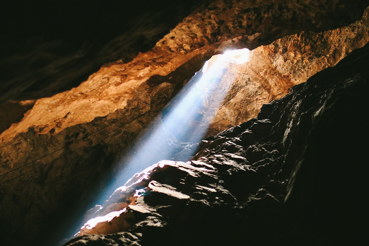 Beam of sunlight shining into the Sterkfontein Caves, Cradle of Humankind, South Africa