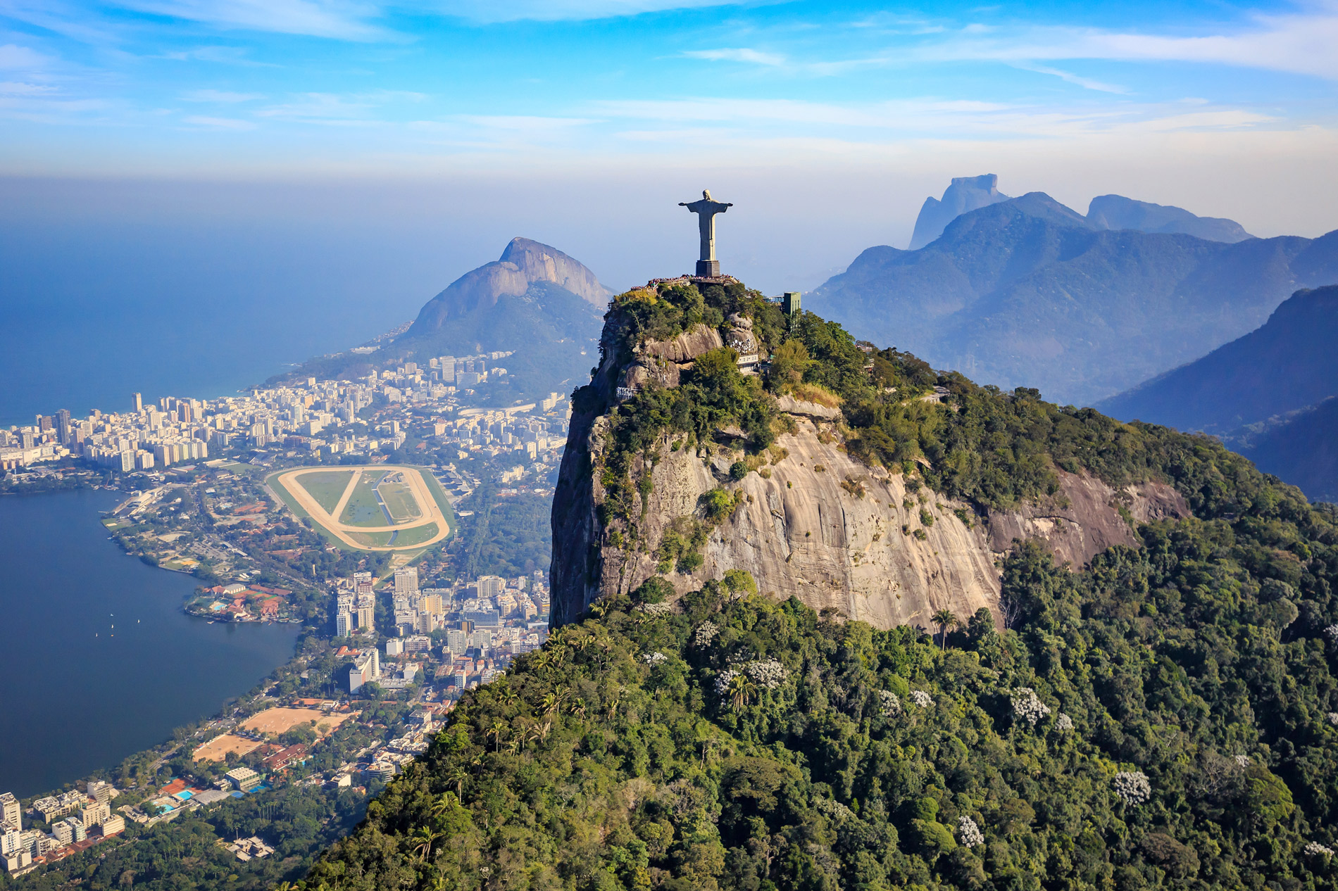 Christ the Redeemer statue on Corcovado above Rio de Janeiro and its lagoon, Brazil