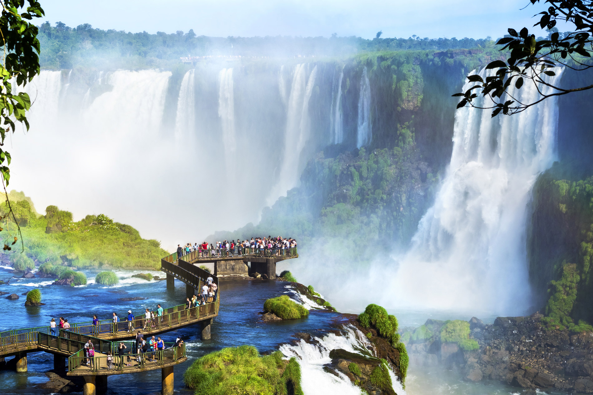 Visitors on a walkway at the foot of Iguazu Falls on the Argentina-Brazil border