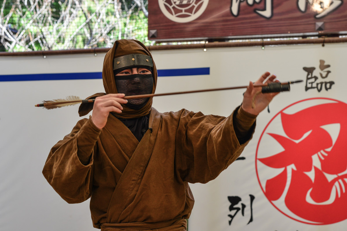 A man wearing Ninja costume and teaching at the Ninja School in Iga City