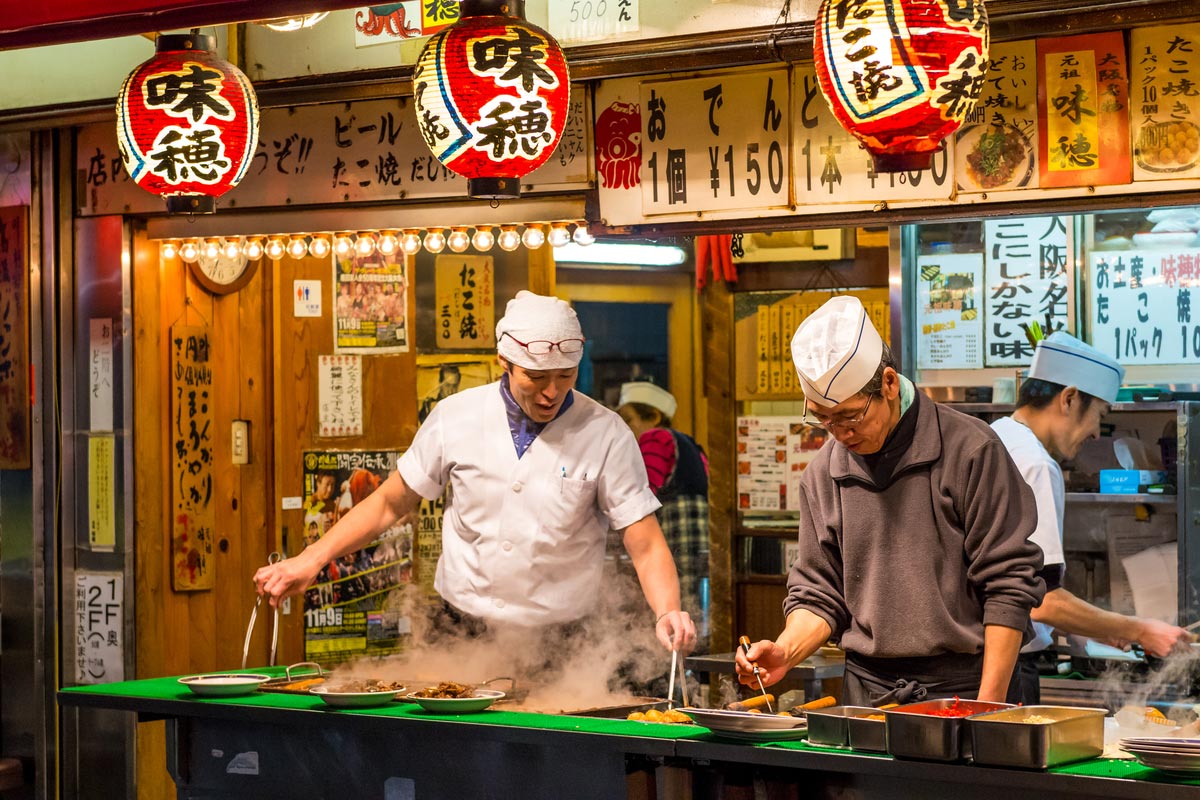 Japanese chefs cooking traditional Japanese street food