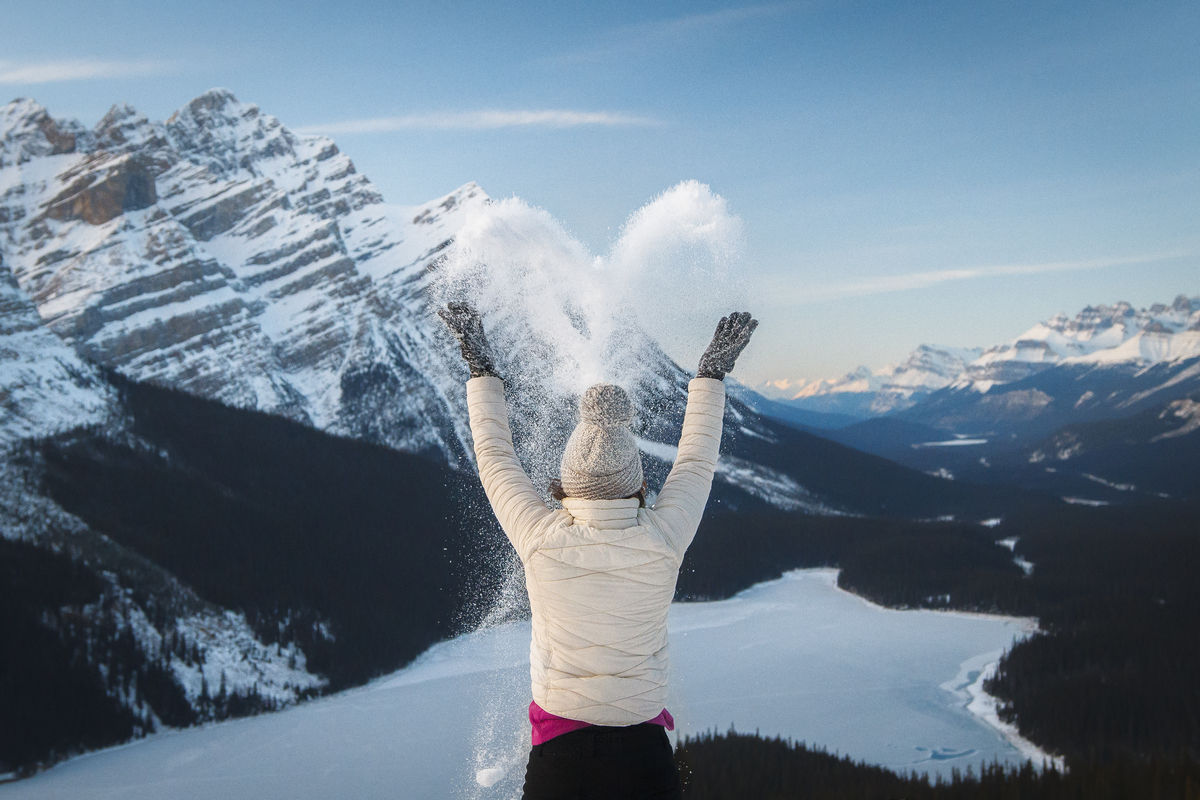 Woman playing with snow