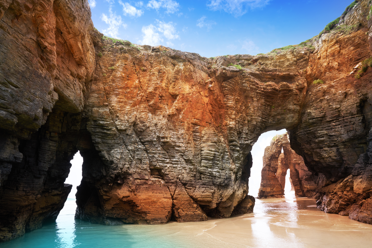 Natural arches on the Beach of Cathedrals in Spain