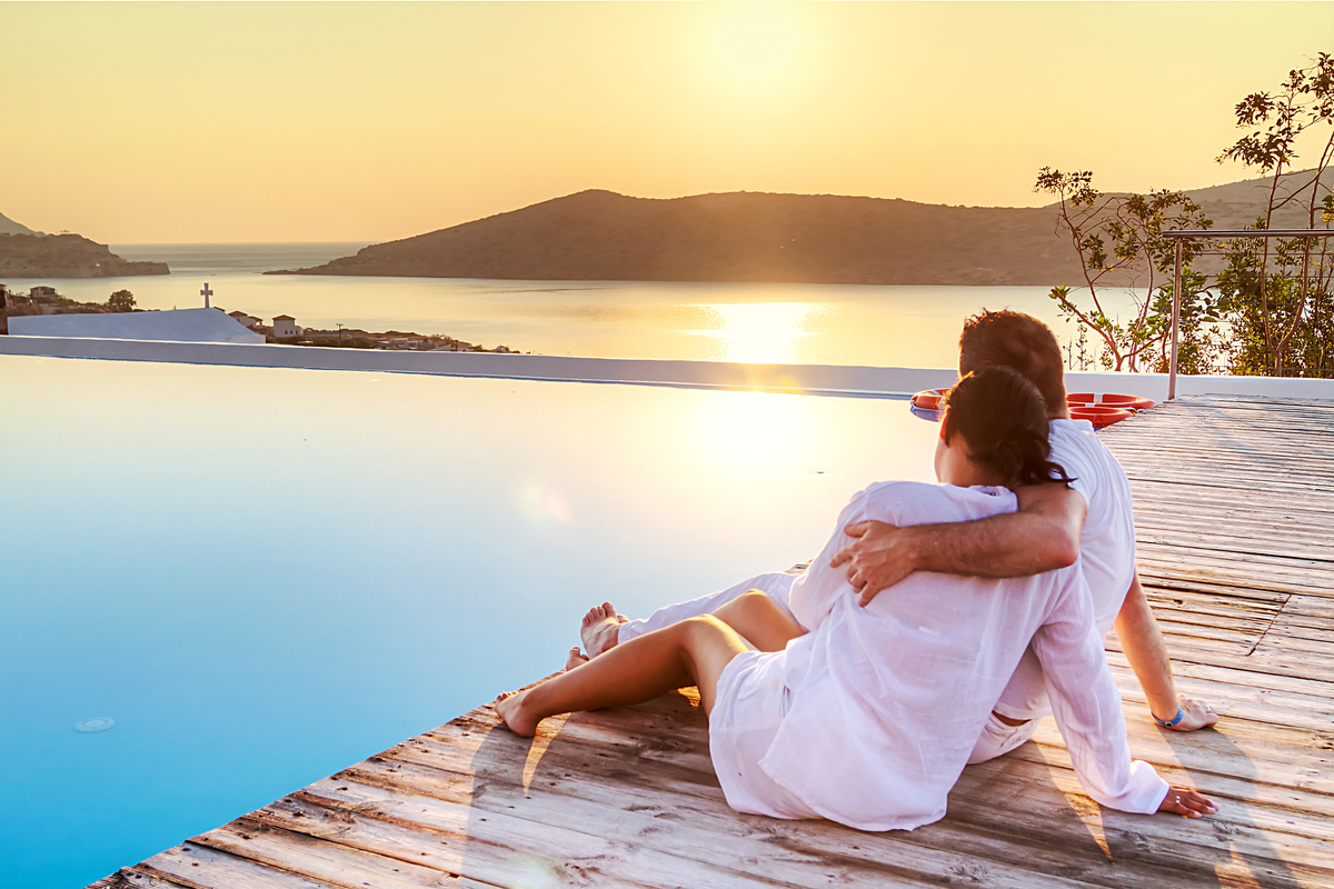 Couple watch sunset in Greece Valentine's Day