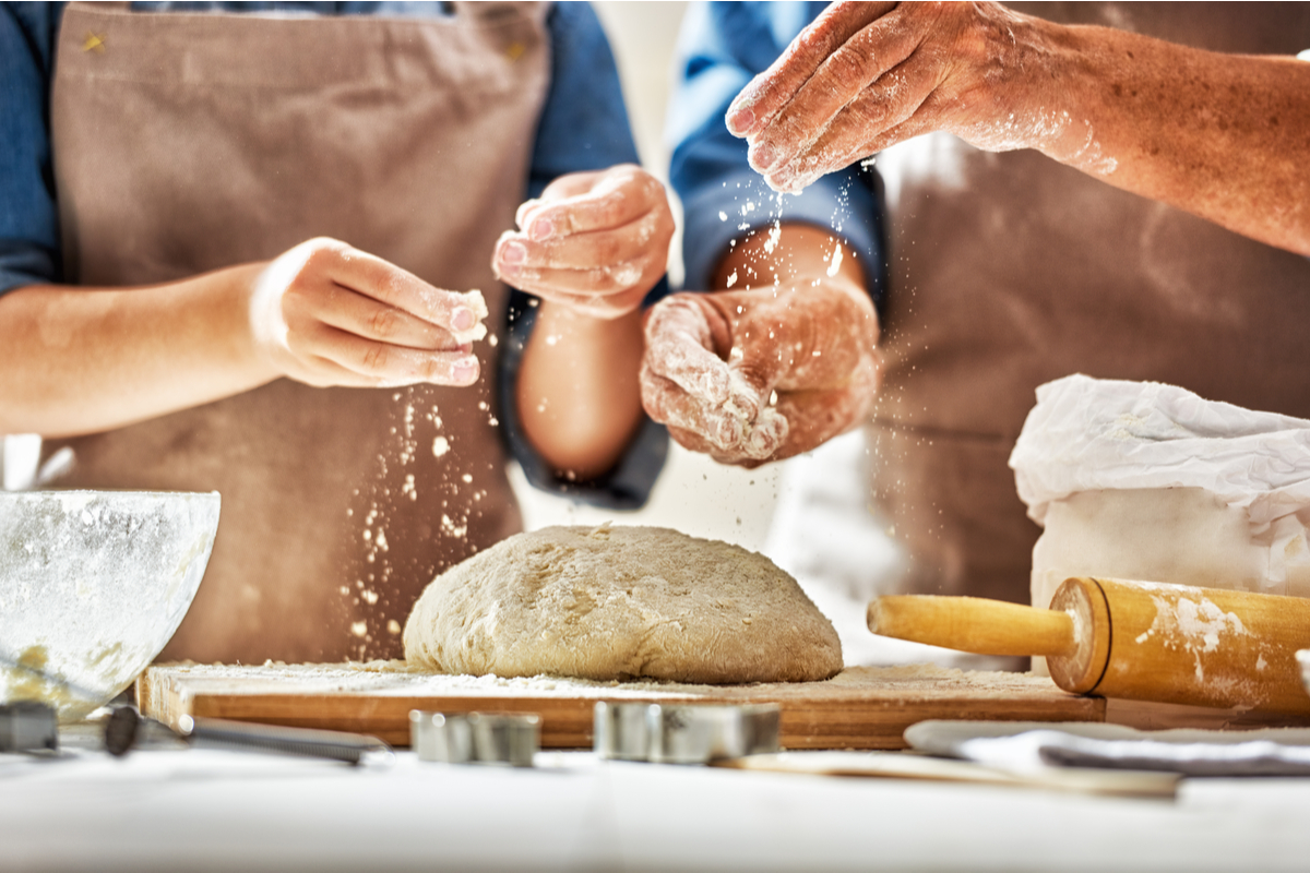 Couple baking bread World Baking Day