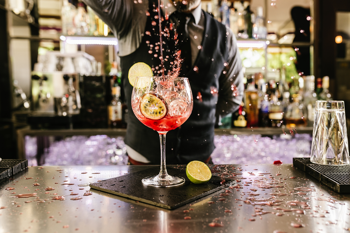 Bartender pouring cocktails