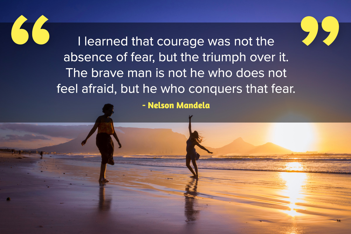 Two women dancing on beach in Cape Town Inspirational quote Nelson Mandela Day