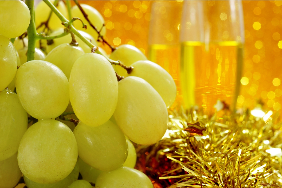 Bunch of grapes and champagne to celebrate the new year in Spain