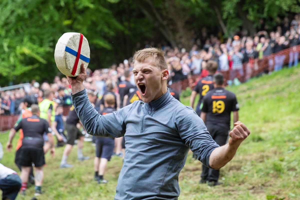 Winner of Cheese Rolling race in Gloucester British Traditions