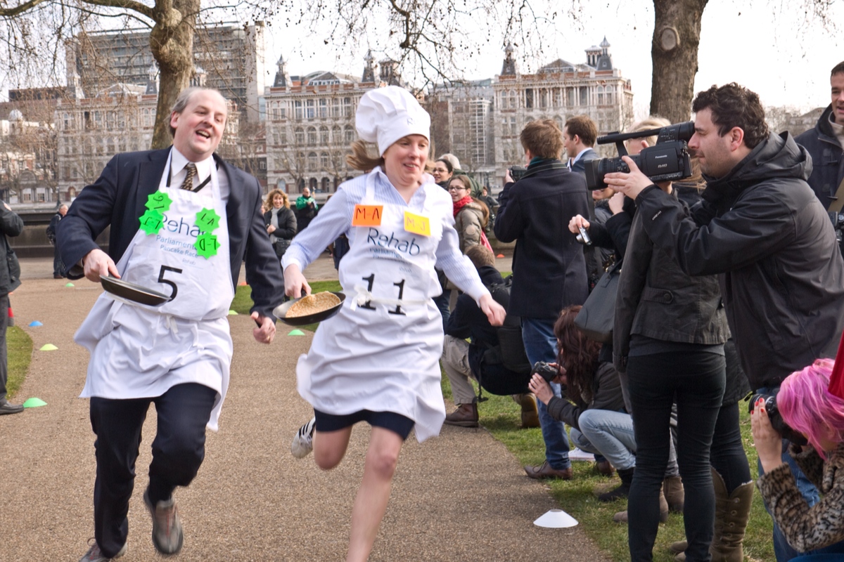Pancake flipping race in England British Traditions