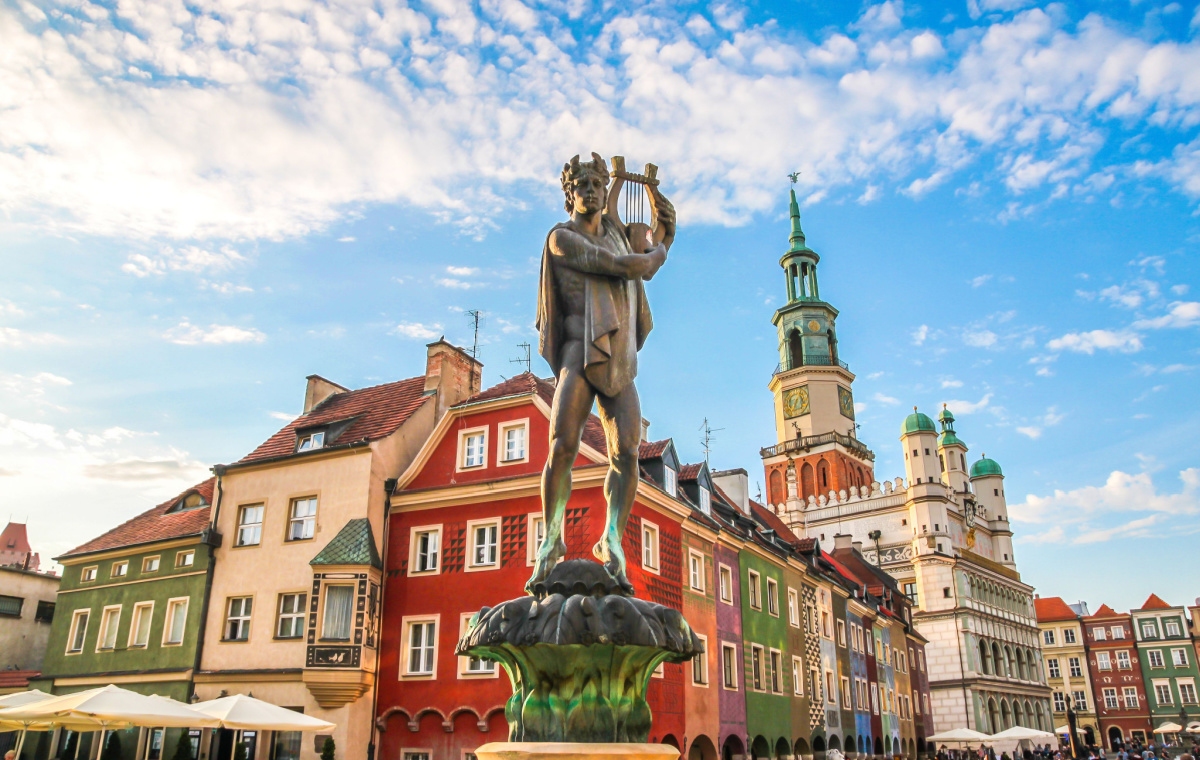 Statue of Apollo and colourful Reniassance facade buildings in Poznan, Poland destinations